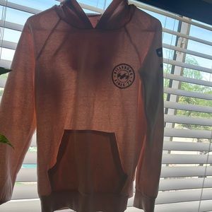 A hoodie it is a medium in womens. Thinner material good for semi cold weather!